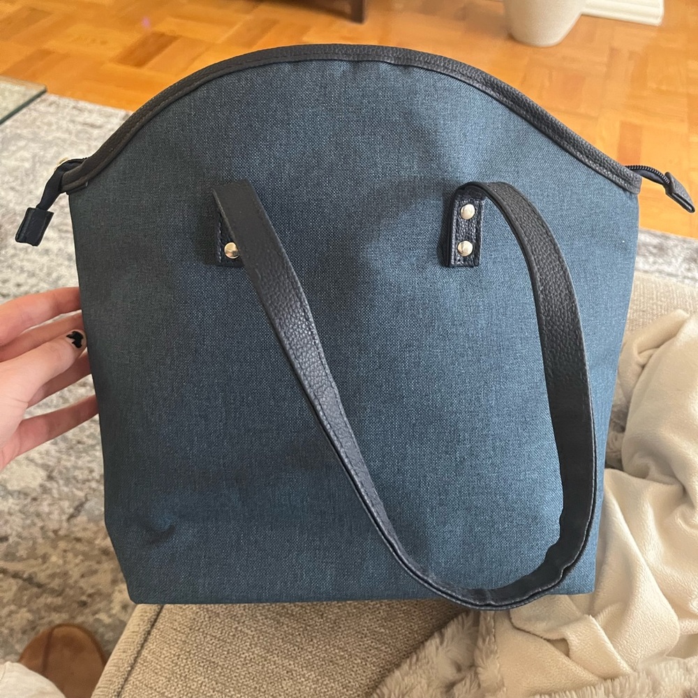 Navy blue lunch box that is insulated inside